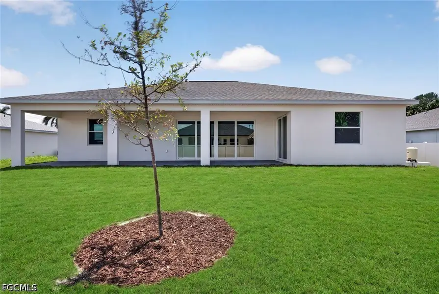 Exterior details and patio area of a home in Cape Coral, Cape Coral (Image 4).