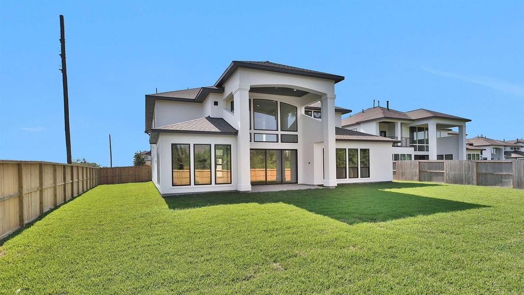 Exterior details and patio area of a home in Sienna 65' - Valencia, Missouri City (Image 3). Exterior details and patio area of a home in Sienna 65' - Valencia, Missouri City (Image 3).