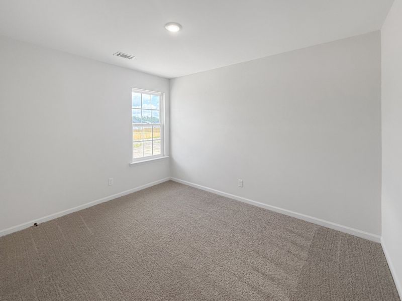 Spacious, unfurnished interior of a new home in The Village at Sassafras, Allenhurst (Image 19).