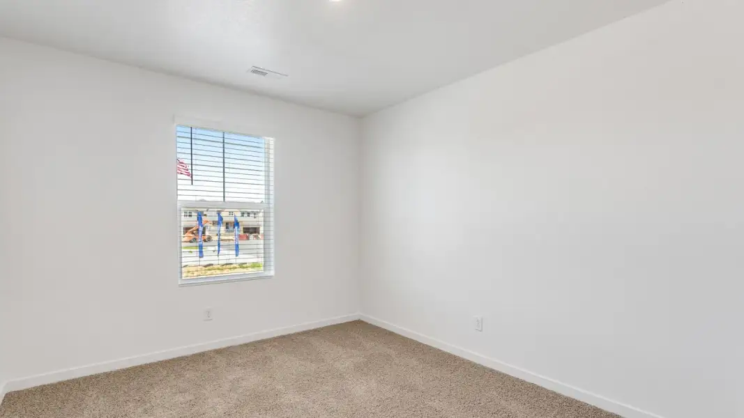 Spacious, unfurnished interior of a new home in Sky Ranch, Watkins (Image 18).