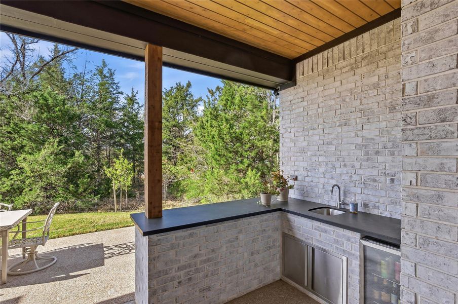 Exterior details and patio area of a home in , Bryan (Image 3).