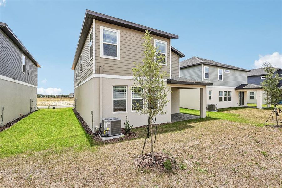 Exterior details and patio area of a home in Cyrene at Minneola, Minneola (Image 4).