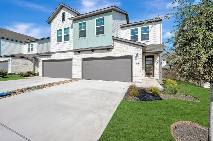 Front exterior of a new home in Park Central, Georgetown, TX, highlighting curb appeal (Image 2). Front exterior of a new home in Park Central, Georgetown, TX, highlighting curb appeal (Image 2).