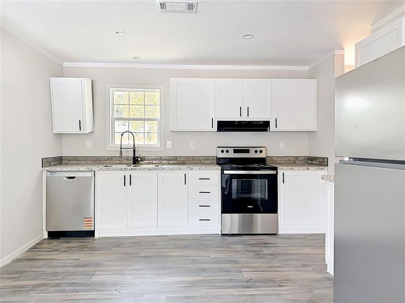 Furnished interior view inside a new home in , Orlando (Image 11).