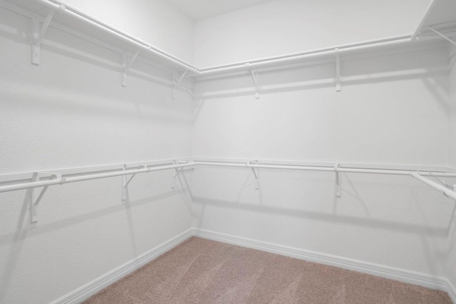 A view of your large primary walk-in Closet A view of your large primary walk-in Closet
