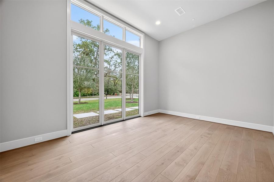 The formal dining room seamlessly borders the kitchen, creating a harmonious flow between culinary creativity and dining sophistication. This design enhances the functionality of the space and fosters an inviting atmosphere for gatherings and celebrations. The formal dining room seamlessly borders the kitchen, creating a harmonious flow between culinary creativity and dining sophistication. This design enhances the functionality of the space and fosters an inviting atmosphere for gatherings and celebrations.