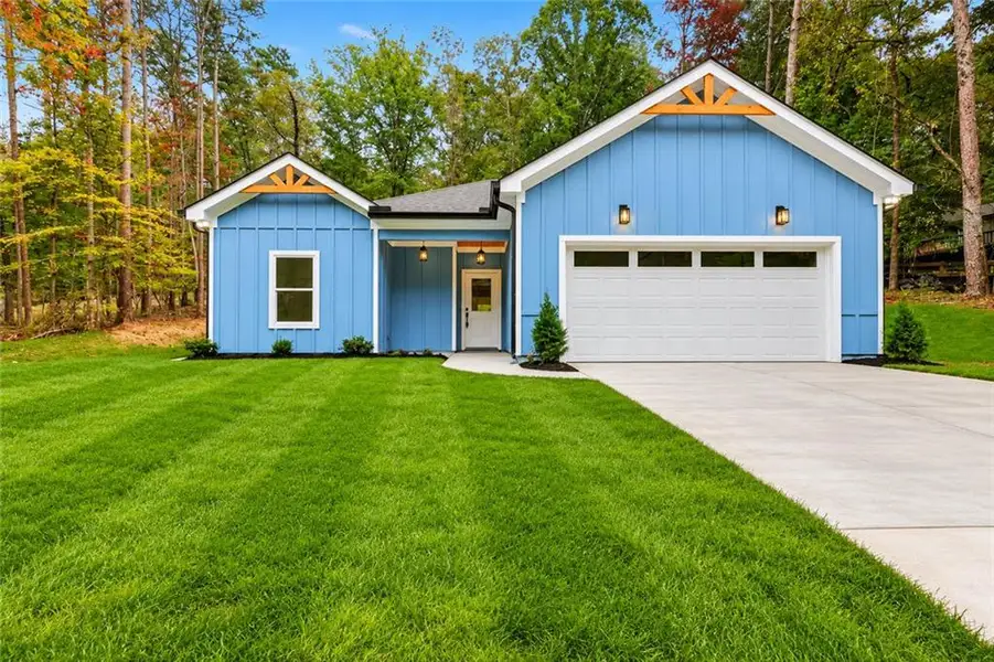 Front exterior of a new home in , Gainesville, GA, highlighting curb appeal (Image 1). Front exterior of a new home in , Gainesville, GA, highlighting curb appeal (Image 1).