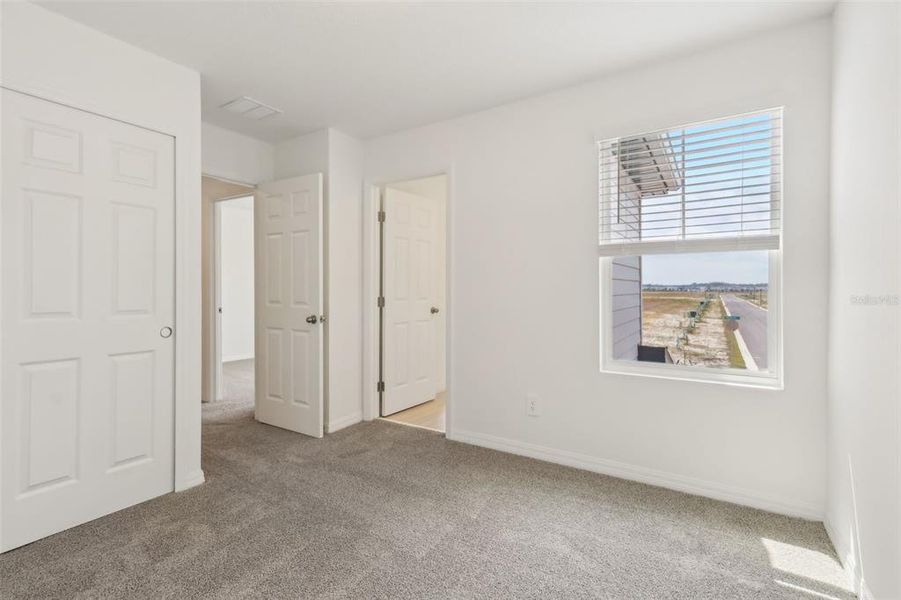 Spacious, unfurnished interior of a new home in The Meadow at Crossprairie Townes, St. Cloud (Image 18).