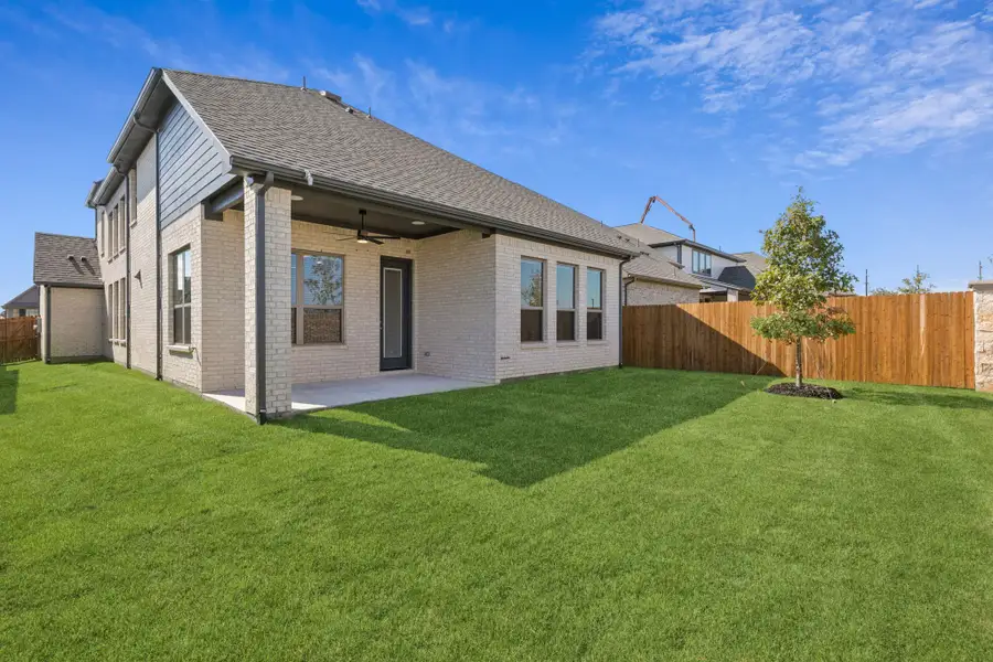 Exterior details and patio area of a home in Heartland, Heartland (Image 2). Exterior details and patio area of a home in Heartland, Heartland (Image 2).