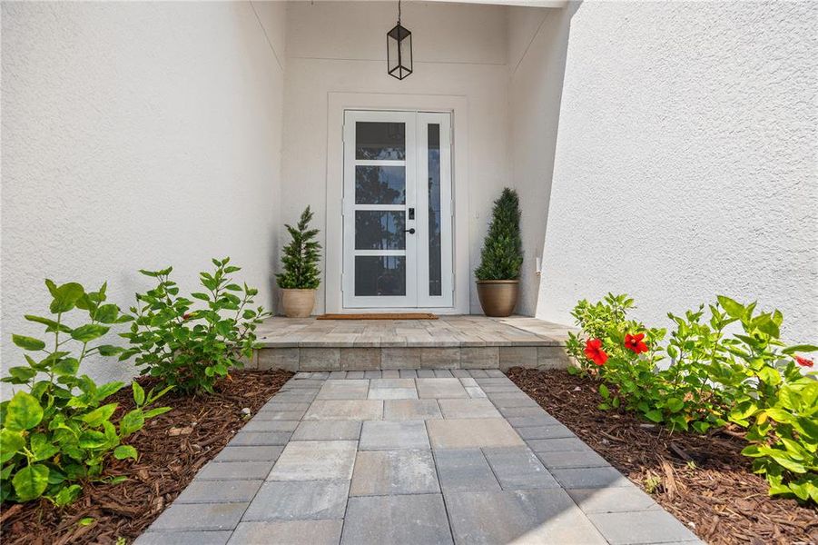 Front exterior of a new home in , North Port, FL, highlighting curb appeal (Image 24). Front exterior of a new home in , North Port, FL, highlighting curb appeal (Image 24).