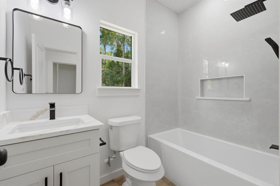 Furnished interior view inside a new home in , Willis (Image 12).