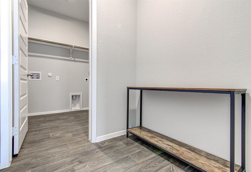 Functional laundry space with convenient hookups and durable flooring. Functional laundry space with convenient hookups and durable flooring.