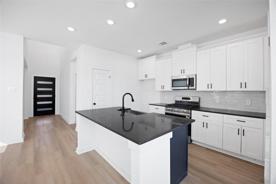 Furnished interior view inside a new home in Kendall Lakes, Alvin (Image 8). Furnished interior view inside a new home in Kendall Lakes, Alvin (Image 8).