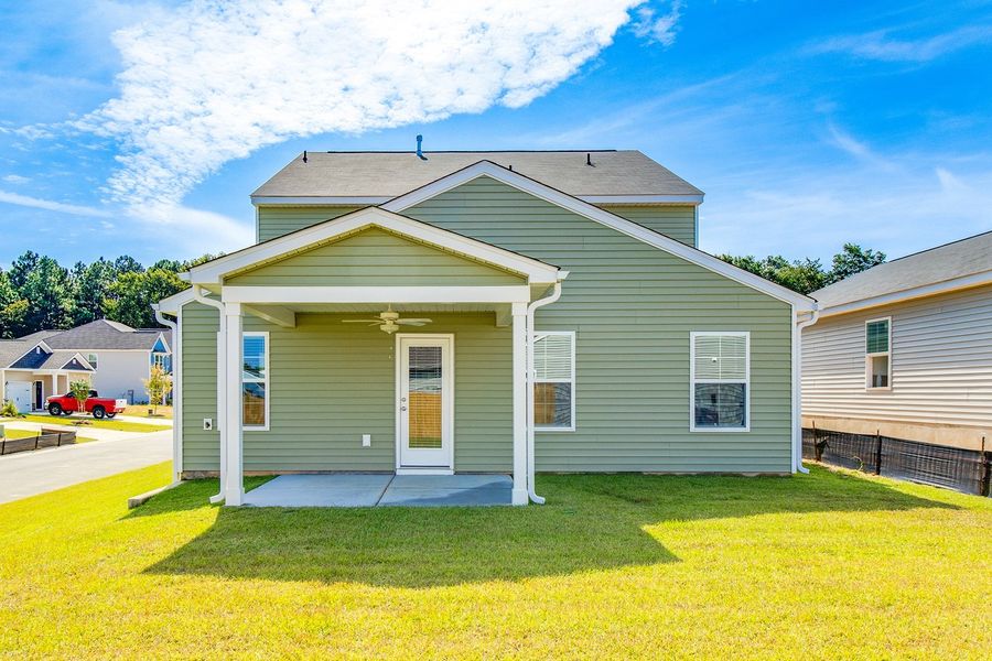 Front exterior of a new home in Winston Point, Gilbert, SC, highlighting curb appeal (Image 20). Front exterior of a new home in Winston Point, Gilbert, SC, highlighting curb appeal (Image 20).