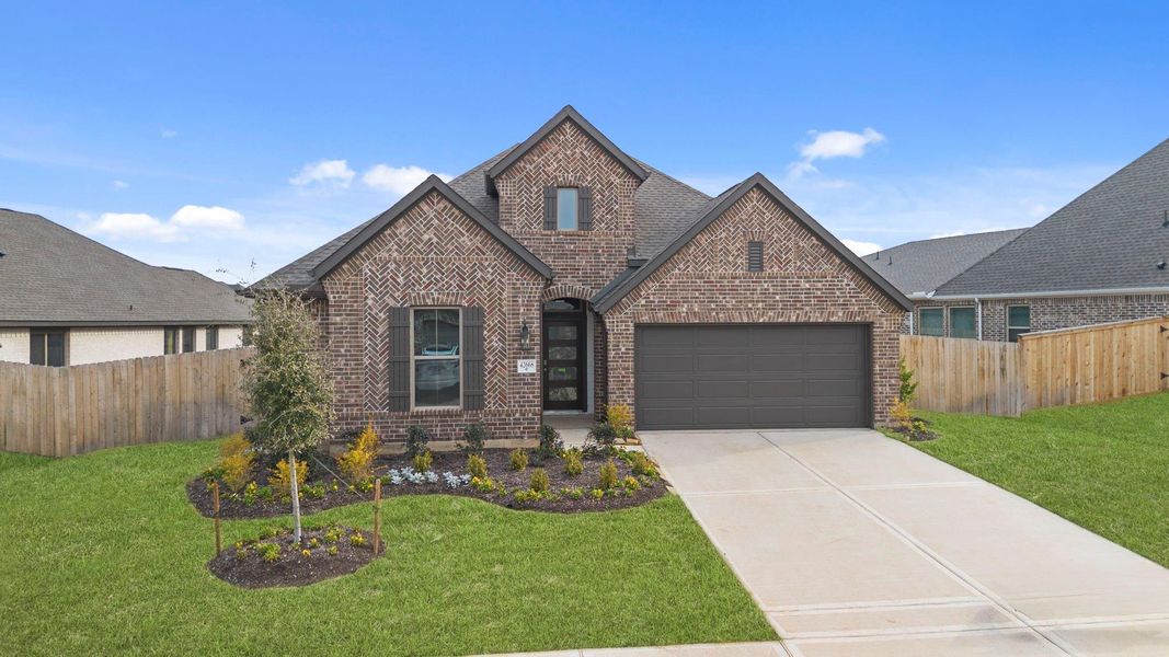 Front exterior of a new home in Escondido, Magnolia, TX, highlighting curb appeal (Image 23).