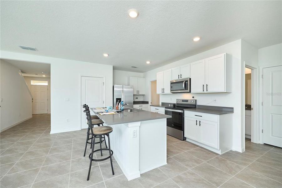 Furnished interior view inside a new home in Westgate at Avalon Park, Wesley Chapel (Image 5).