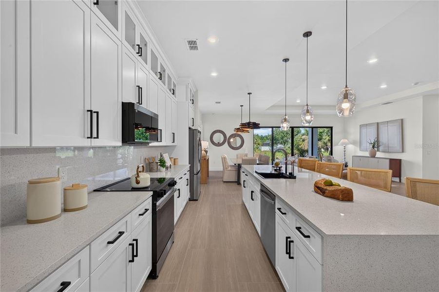 Furnished interior view inside a new home in , Port Charlotte (Image 13).