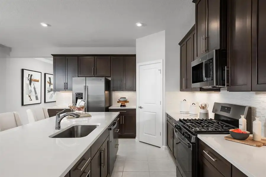 Representative furnished interior of a home built from the Oakton by Ryan Homes in Copperleaf, Ocala (Image 2).