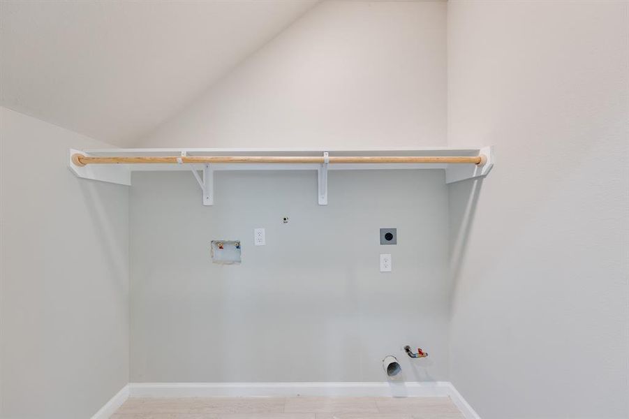 The home offers an interior laundry space, thoughtfully designed for convenience.