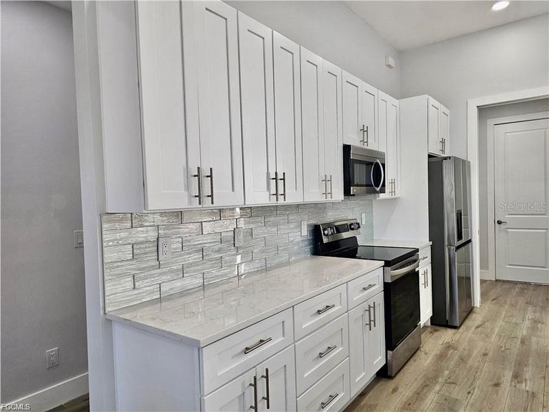 Furnished interior view inside a new home in , Cape Coral (Image 7).