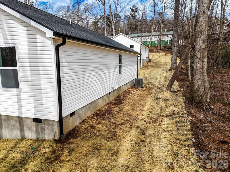 Exterior details and patio area of a home in , Black Mountain (Image 24). Exterior details and patio area of a home in , Black Mountain (Image 24).