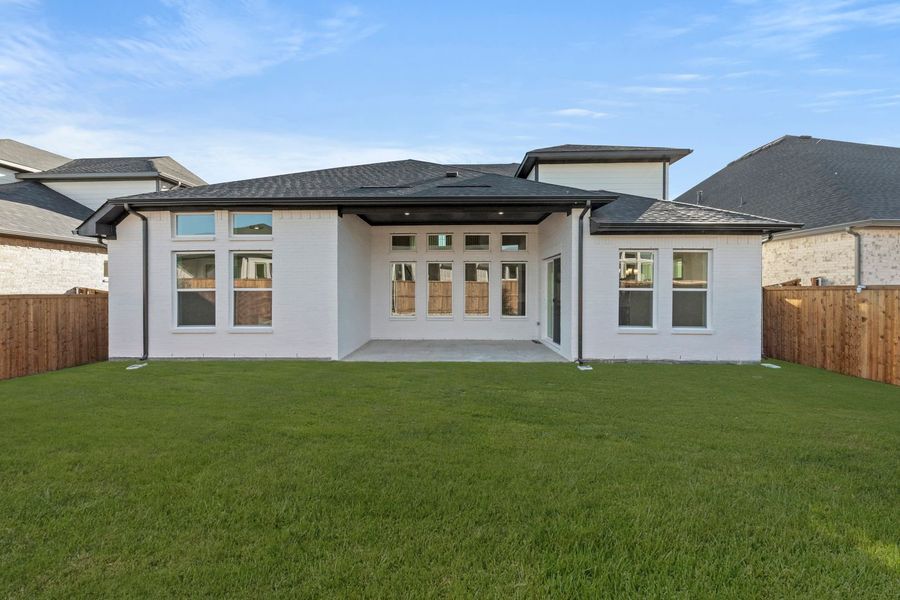 Exterior details and patio area of a home in Wildflower Ranch, Justin (Image 4). Exterior details and patio area of a home in Wildflower Ranch, Justin (Image 4).