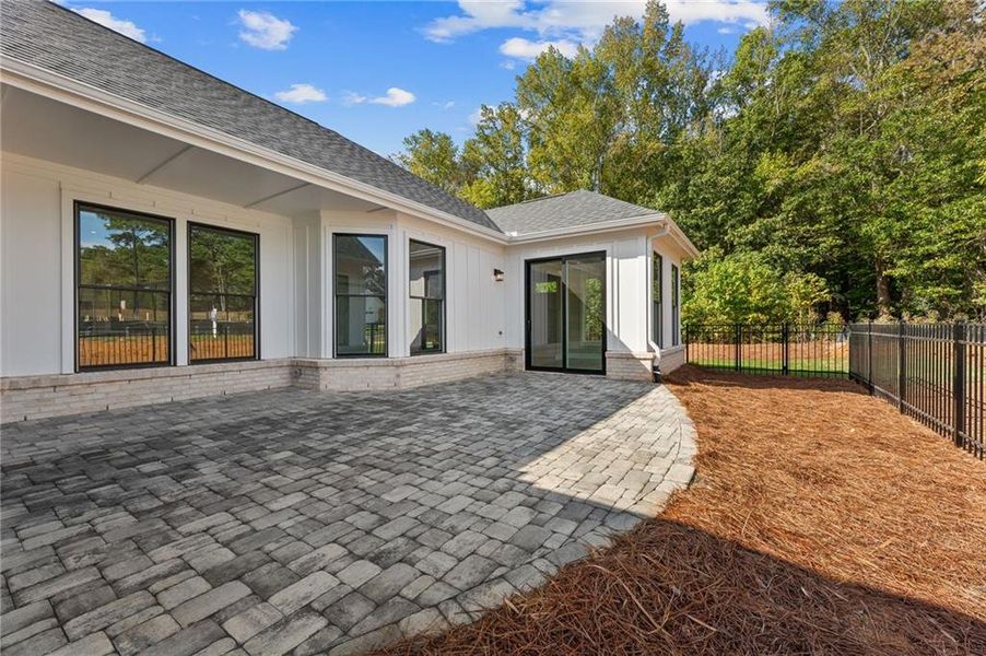 Exterior details and patio area of a home in The Courtyards by The Manor, Alpharetta (Image 31). Exterior details and patio area of a home in The Courtyards by The Manor, Alpharetta (Image 31).