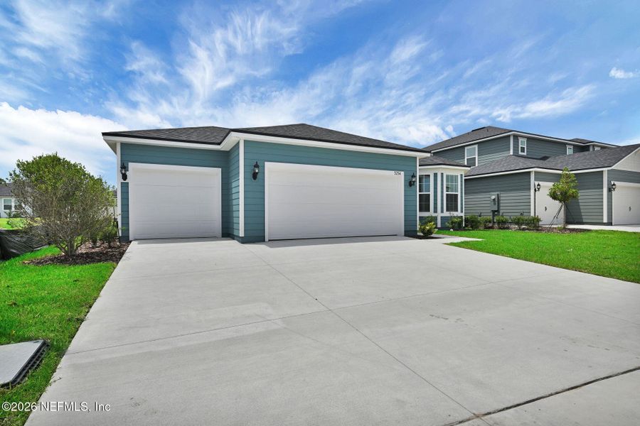Front exterior of a new home in Hyland Trail, Green Cove Springs, FL, highlighting curb appeal (Image 25).