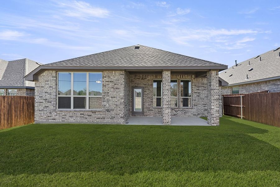 Representative exterior photo of a completed home built from the Cambridge by Impression Homes in Timberbrook, Justin, TX (Image 26). Representative exterior photo of a completed home built from the Cambridge by Impression Homes in Timberbrook, Justin, TX (Image 26).