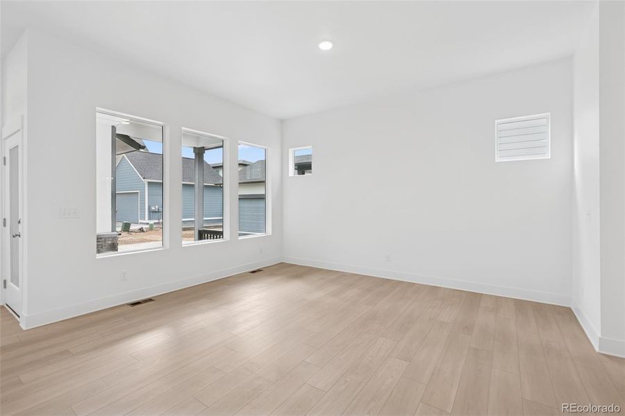 Spacious, unfurnished interior of a new home in Painted Prairie Cottage, Aurora (Image 30).