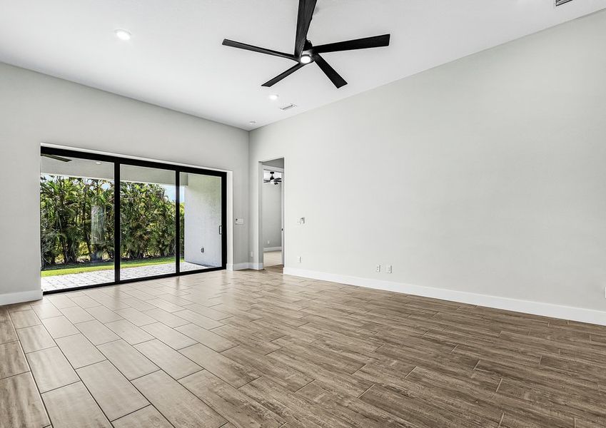 Large living room with a sliding window wall.