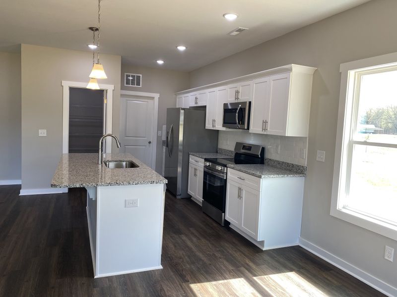 Representative furnished interior of a home built from the Grant by Foundation Home Builders LLC in Old Hickory Crossing, Mocksville (Image 5).
