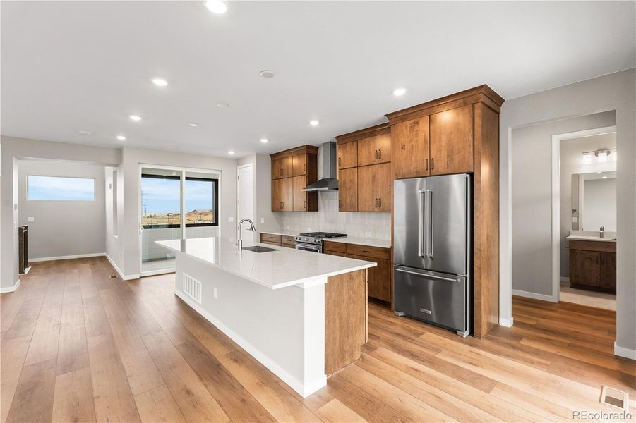 Furnished interior view inside a new home in Tribute at Lyric, Lone Tree (Image 13).