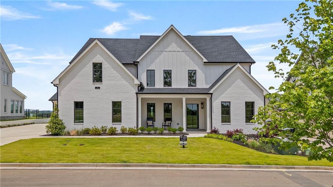 Front exterior of a new home in , Ball Ground, GA, highlighting curb appeal (Image 2).