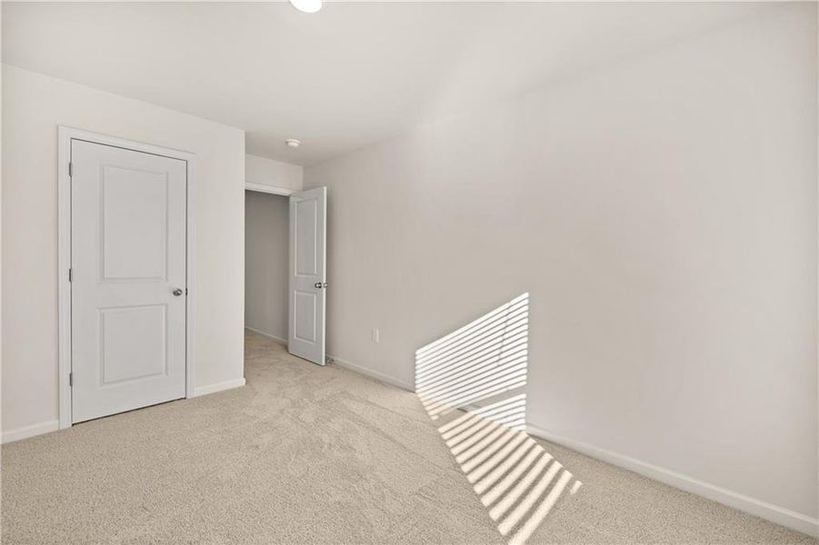Spacious, unfurnished interior of a new home in Lake Carlton, Loganville (Image 24).
