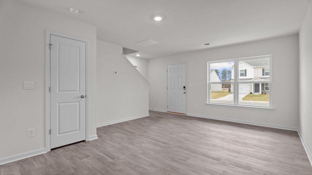 Representative unfurnished interior of a home built from the Rachel by D.R. Horton in Hobbs Farm, Ayden (Image 12).