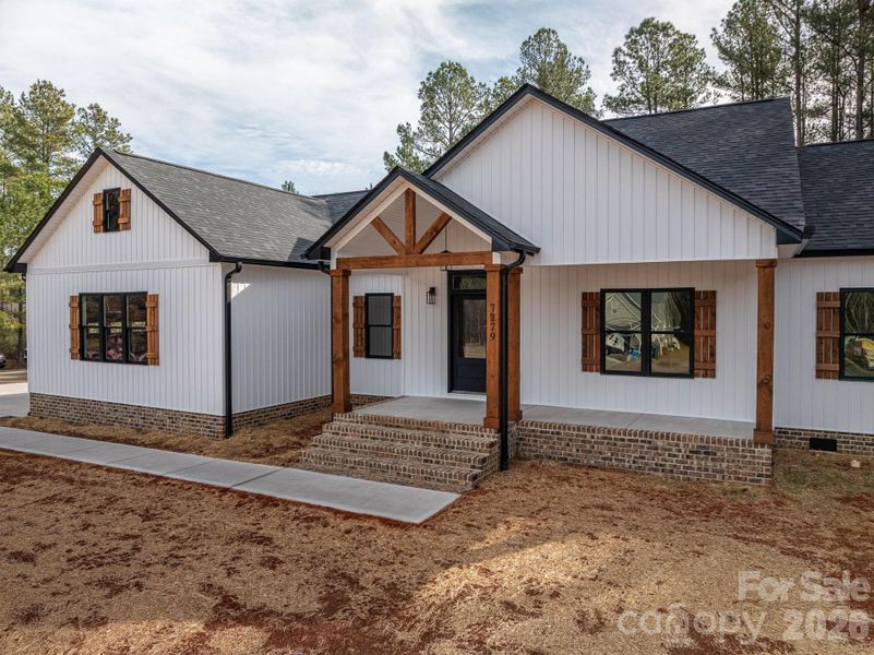 Front exterior of a new home in , Vale, NC, highlighting curb appeal (Image 13).