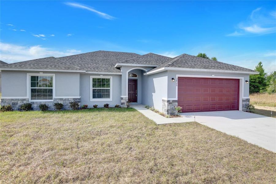 Front exterior of a new home in , Kissimmee, FL, highlighting curb appeal (Image 2). Front exterior of a new home in , Kissimmee, FL, highlighting curb appeal (Image 2).