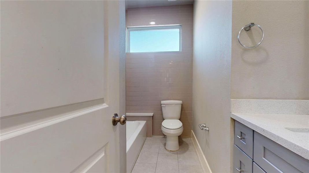 The second full-bath upstairs includes a tub/shower combination and nice vanity.