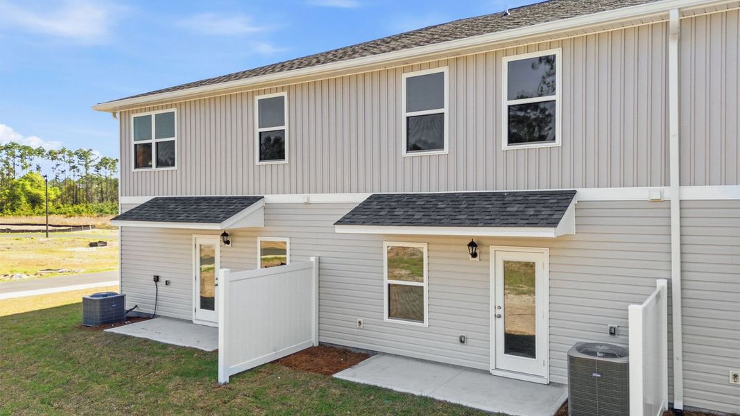 Exterior details and patio area of a home in Chateau Nemours, Port Saint Joe (Image 24).