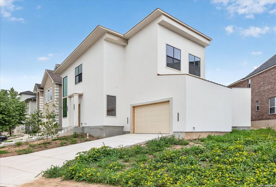 Front exterior of a new home in , San Antonio, TX, highlighting curb appeal (Image 24). Front exterior of a new home in , San Antonio, TX, highlighting curb appeal (Image 24).