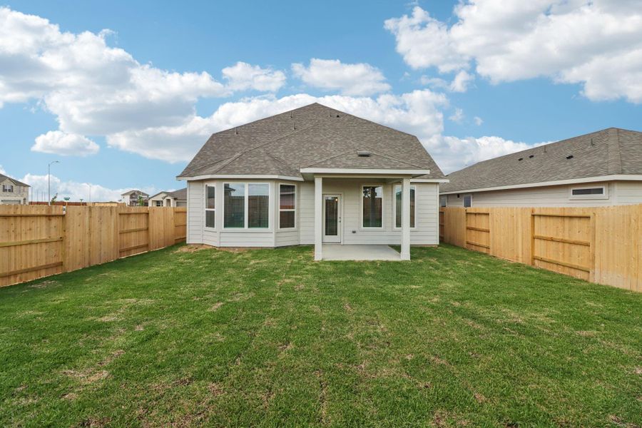 Exterior details and patio area of a home in Sanford Farms - Premier Series, Waller (Image 3).