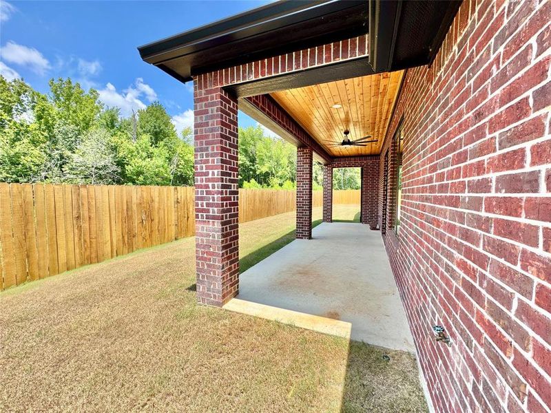 Exterior details and patio area of a home in , Lindale (Image 4). Exterior details and patio area of a home in , Lindale (Image 4).