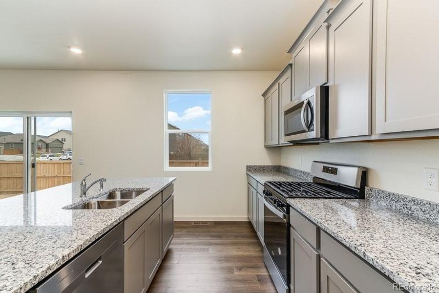 Furnished interior view inside a new home in Sky Ranch, Watkins (Image 12).