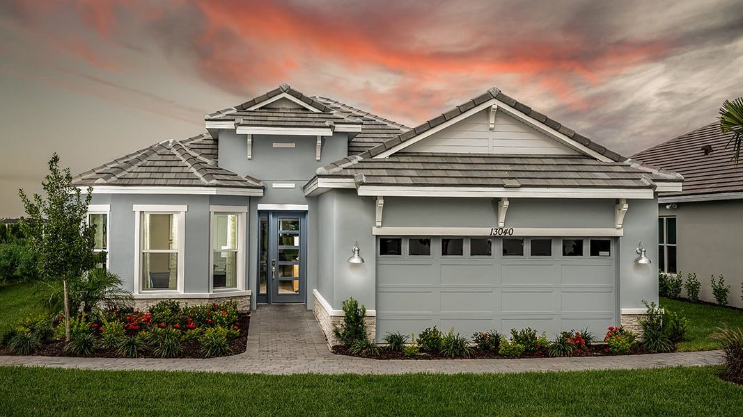 Representative exterior photo of a completed home built from the Farnese by Taylor Morrison in Astor Creek Golf and Country Club, Port St. Lucie, FL (Image 24).