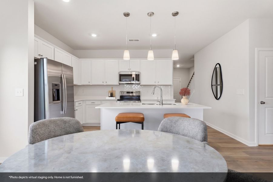 Furnished interior view inside a new home in Piper Creek, Newton (Image 7).