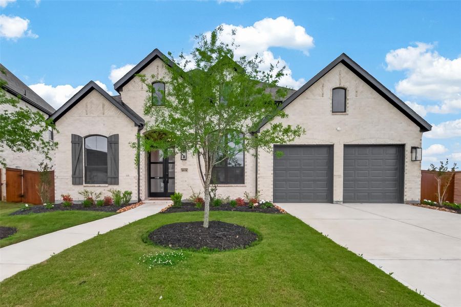 A view of the home during daylight hours, magnificent as well!