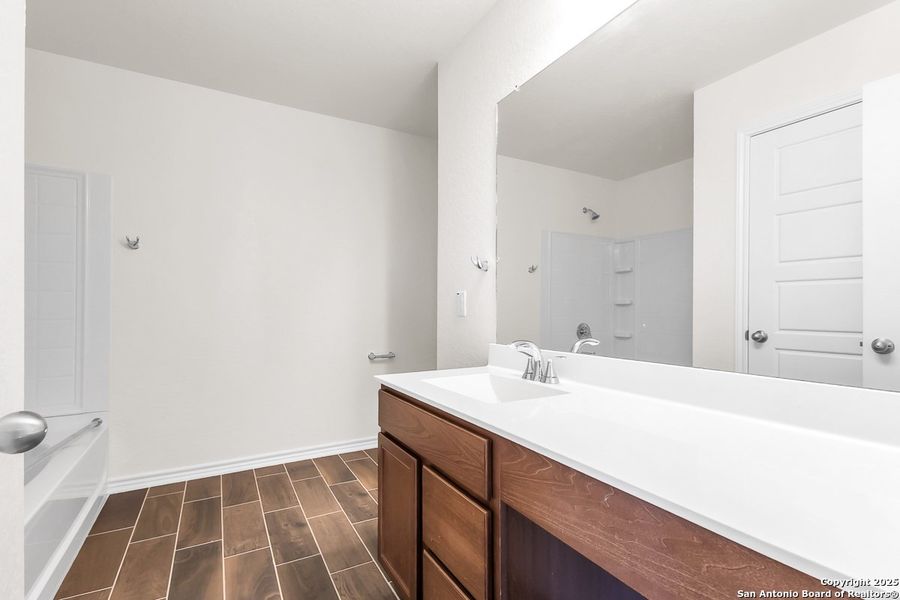 Furnished interior view inside a new home in Spanish Trails Villas, San Antonio (Image 5).