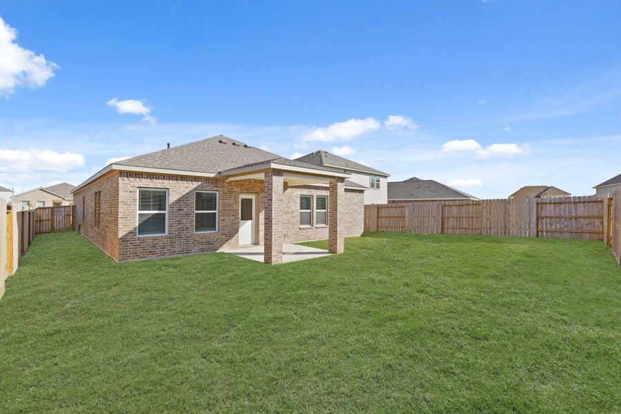 Exterior details and patio area of a home in Sunterra, Katy (Image 3). Exterior details and patio area of a home in Sunterra, Katy (Image 3).