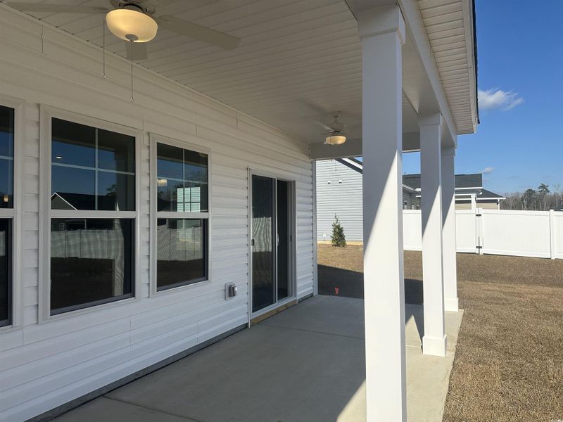 View of patio with ceiling fan
